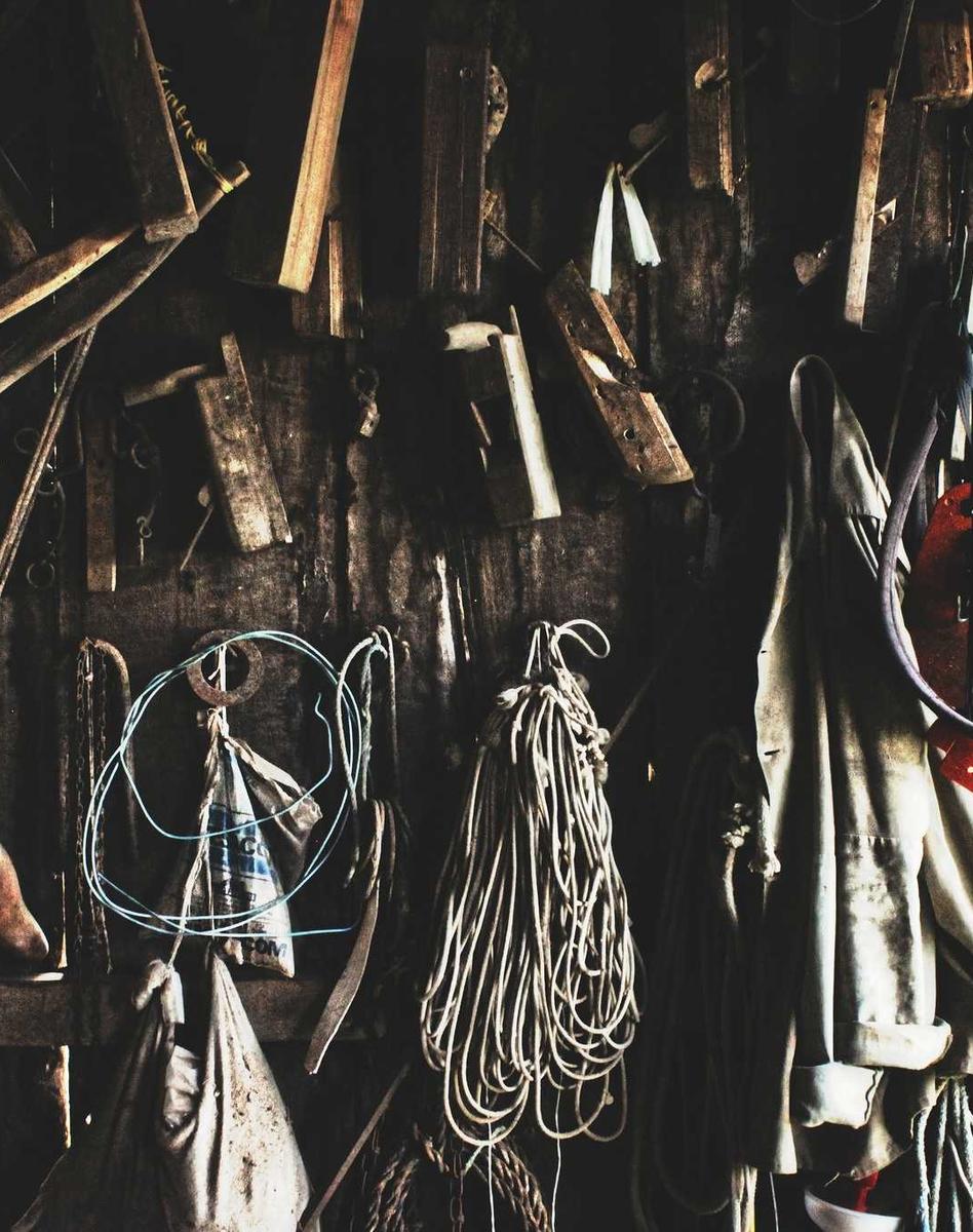 Tools and ropes hanging in a workshop